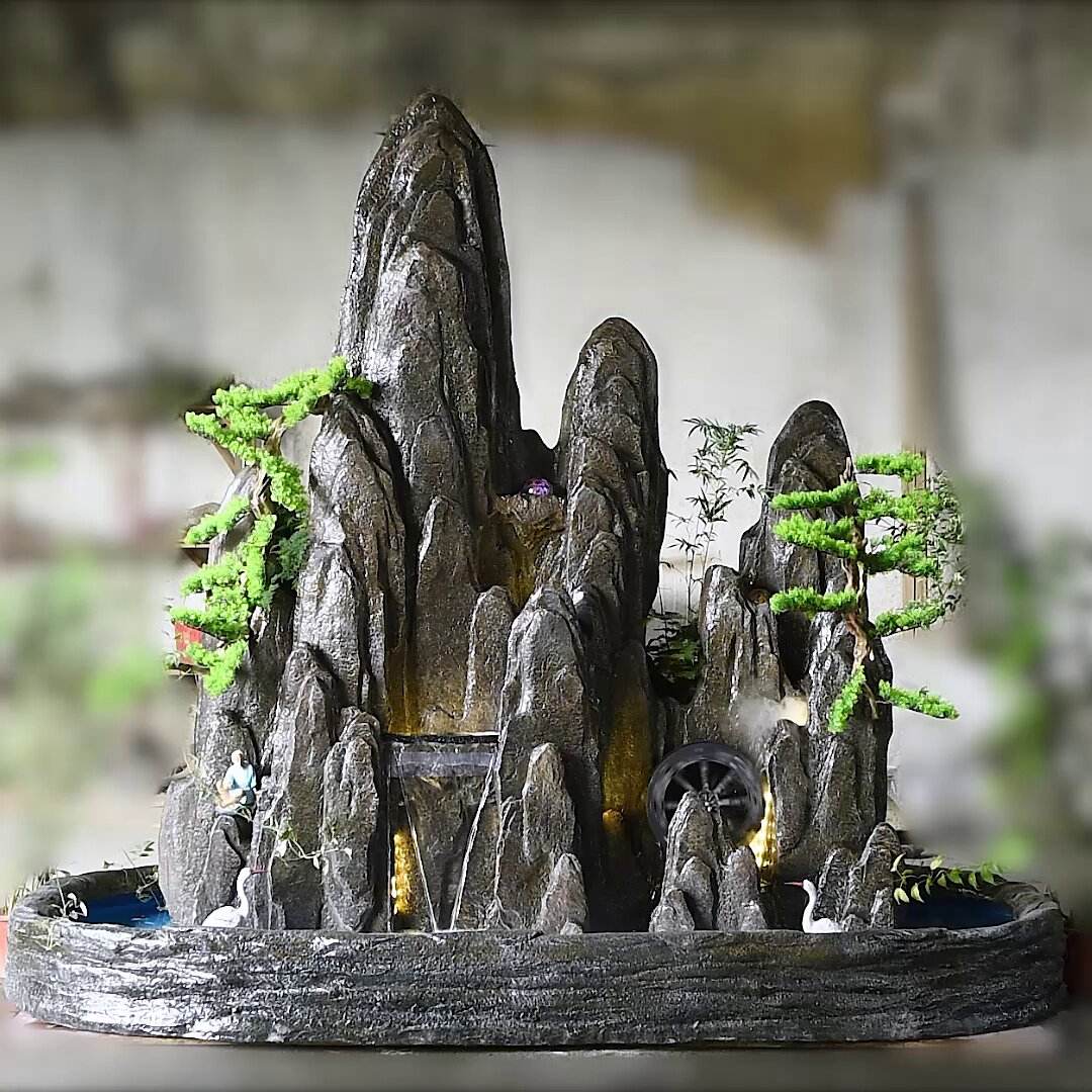 庭院假山怎么摆风水好一点(庭院风水假山下可以放石头吗)